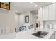Bright kitchen with breakfast bar featuring stylish seating and modern finishes, enhancing the cooking and dining experience at 4947 Green Dolphin Way, Kiawah Island, SC 29455