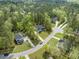 Aerial view of neighborhood featuring tree-lined streets and perfectly manicured lawns at 5005 Buckland Trl, Ridgeville, SC 29472
