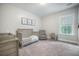 Neutral Bedroom with gray furniture and nature-themed decor at 5005 Buckland Trl, Ridgeville, SC 29472