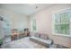 Bright playroom featuring natural light, playroom furniture, and a cozy gray convertible sofa at 5005 Buckland Trl, Ridgeville, SC 29472