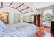 Beautiful bedroom with canopy bed, hardwood floors, and natural light; perfect for relaxation at 503 W Carolina Ave, Summerville, SC 29483