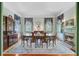 Elegant dining room featuring a fireplace, built-in cabinet, and seating for six at 503 W Carolina Ave, Summerville, SC 29483