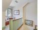 Upstairs hallway featuring a window seat nook and view of the staircase at 503 W Carolina Ave, Summerville, SC 29483