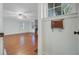 Inviting living room with hardwood floors and a charming brick fireplace, perfect for cozy evenings at 503 W Carolina Ave, Summerville, SC 29483