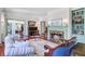 Comfortable living room with a fireplace, hardwood floors, and elegant furniture at 503 W Carolina Ave, Summerville, SC 29483