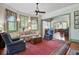 Cozy living room with hardwood floors, comfortable seating, and vintage charm at 503 W Carolina Ave, Summerville, SC 29483