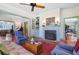 Charming living room with fireplace, built-in shelving, and views to the kitchen at 503 W Carolina Ave, Summerville, SC 29483