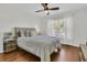 Comfortable bedroom with a plush bed, bedside tables, and natural light from the window at 5033 Carrington Ct, Summerville, SC 29485