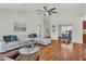 Bright and spacious living room with high ceilings and hardwood floors at 5033 Carrington Ct, Summerville, SC 29485