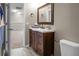 Bathroom with a rich wood cabinet and a white countertop at 515 Flycatcher Dr, Goose Creek, SC 29445