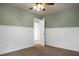 Bedroom with light green walls, carpeted floor, and a ceiling fan at 515 Flycatcher Dr, Goose Creek, SC 29445