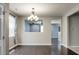 Bright dining room featuring hardwood floors and a contemporary chandelier at 515 Flycatcher Dr, Goose Creek, SC 29445