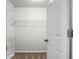 Walk-in closet showing shelving and carpeted floor, door ajar at 515 Flycatcher Dr, Goose Creek, SC 29445