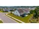 An aerial view of the back side of a home in a neighborhood with well-kept lawns at 554 Tranquil Waters Way, Summerville, SC 29486