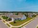 An aerial view showcasing the community and the home's position on a corner lot at 554 Tranquil Waters Way, Summerville, SC 29486