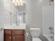 Neat bathroom featuring vanity, toilet and shower with tile surround at 554 Tranquil Waters Way, Summerville, SC 29486