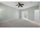 Spacious bedroom with carpet and view to the bathroom and walk-in closet at 554 Tranquil Waters Way, Summerville, SC 29486