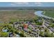 Aerial view of property, surroundings and marsh views at 5554 Colonial Chatsworth Cir, North Charleston, SC 29418