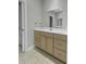 Bright bathroom featuring a vanity with a white countertop and neutral-toned cabinetry at 5554 Colonial Chatsworth Cir, North Charleston, SC 29418