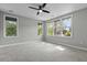Comfortable bedroom with great natural lighting and ceiling fan at 5554 Colonial Chatsworth Cir, North Charleston, SC 29418
