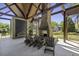 Outdoor common area features fireplace, seating, and a serene view of the surrounding landscape at 5554 Colonial Chatsworth Cir, North Charleston, SC 29418