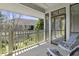 Relaxing screened porch with view at 5554 Colonial Chatsworth Cir, North Charleston, SC 29418