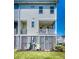 The backyard features outdoor seating for enjoying sunny days and cool evenings at 571 Mclernon, Johns Island, SC 29455