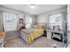Bright bedroom with desk, large windows and neutral carpet at 571 Mclernon, Johns Island, SC 29455