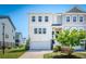 Charming two-story home with a well-manicured lawn and a two-car garage at 571 Mclernon, Johns Island, SC 29455