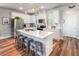 Modern kitchen with stainless steel appliances, a kitchen island with seating, and ample counter space at 571 Mclernon, Johns Island, SC 29455