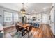 Bright and open floor plan with a dining area, kitchen island and stainless steel appliances at 571 Mclernon, Johns Island, SC 29455