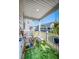 Cozy porch with chairs and plants is the perfect spot for relaxation outdoors at 571 Mclernon, Johns Island, SC 29455