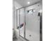 Glass enclosed shower with seating and plants in window at 571 Mclernon, Johns Island, SC 29455