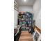 A well-stocked bookshelf with a variety of framed artwork at 571 Mclernon, Johns Island, SC 29455