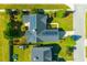 Perfect aerial view of a beautiful home with solar panels and lush backyard at 7601 Stargazer Dr, Hanahan, SC 29410