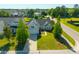 Great aerial shot of home with solar panels, lush green lawn, and professional landscaping at 7601 Stargazer Dr, Hanahan, SC 29410