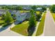 Charming home aerial view with solar panels, lush green lawn and street view at 7601 Stargazer Dr, Hanahan, SC 29410
