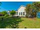 Serene backyard with verdant landscaping, ideal for outdoor relaxation and entertaining, with solar panels at 7601 Stargazer Dr, Hanahan, SC 29410