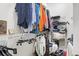 Organized walk-in closet with hanging racks and shelves for storage at 7601 Stargazer Dr, Hanahan, SC 29410