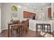 Open concept featuring dining area, kitchen with granite counters, and lots of natural light at 7601 Stargazer Dr, Hanahan, SC 29410