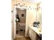 Bathroom featuring a vanity sink and tub with decor accents at 7943 Vermont Rd, North Charleston, SC 29418