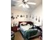 Bedroom featuring a bed with a patterned comforter and wall decor at 7943 Vermont Rd, North Charleston, SC 29418