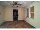 Dilapidated room with damaged walls, ceilings, and boarded-up windows, indicating a property in poor condition at 813 W 1St North St, Summerville, SC 29483