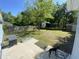 Spacious backyard with shed, patio, BBQ grill, and fenced in yard at 816 Savage Rd, Charleston, SC 29414