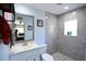 Modern bathroom features updated vanity, framed mirror, and stylish tiled walk-in shower at 816 Savage Rd, Charleston, SC 29414