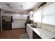 Bright kitchen with white cabinets, stainless steel appliances and ample counter space at 816 Savage Rd, Charleston, SC 29414