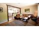 Inviting living room featuring hardwood floors and a comfortable seating area with views to the kitchen at 816 Savage Rd, Charleston, SC 29414