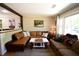 Inviting living room featuring hardwood floors and a comfortable seating area with views to the kitchen at 816 Savage Rd, Charleston, SC 29414