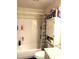 Bathroom with shower-tub combo and white vanity with storage at 8330 Longridge Rd, North Charleston, SC 29418