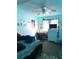 Bedroom with ceiling fan, desk and dresser, and colorful wall decor at 8330 Longridge Rd, North Charleston, SC 29418